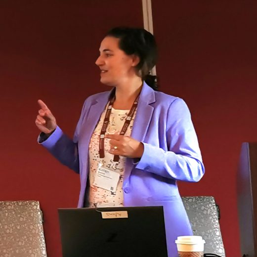 TU Dortmund senior researcher Katrin Bauer speaking on stage